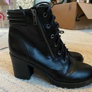 Black heeled combat boots